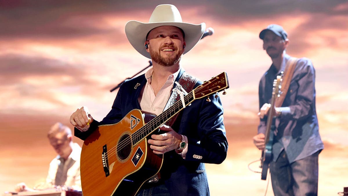 Cody Johnson performing onstage at the MGM Grand Garden Arena in Las Vegas