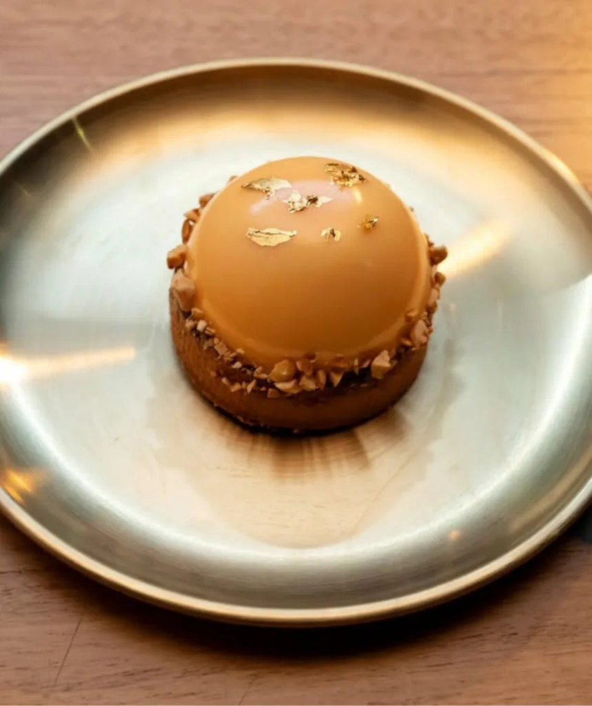 Picture of Hannah Johnson from MasterChef Australia's chocolate and orange dome dessert in Sweet Week.
