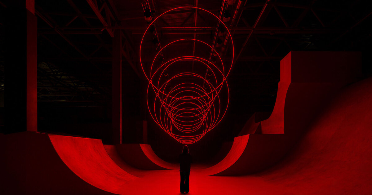 floating rings of light redraw space in SpY’s kinetic installation