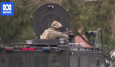 Armoured police vehicle deployed to siege in Spotswood in Melbourne's inner west