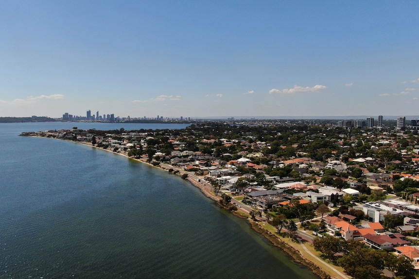 An aerial image of the southern suburb of Applecross and the Swan River, looking north with the Perth CBD in the distance.