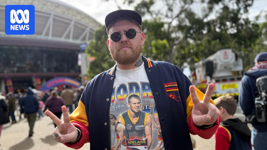 Adelaide Crows fans wish Tony Modra well as they take on Melbourne at Adelaide Oval