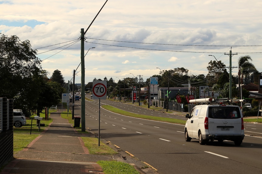 A main road with a median strip down the middle.