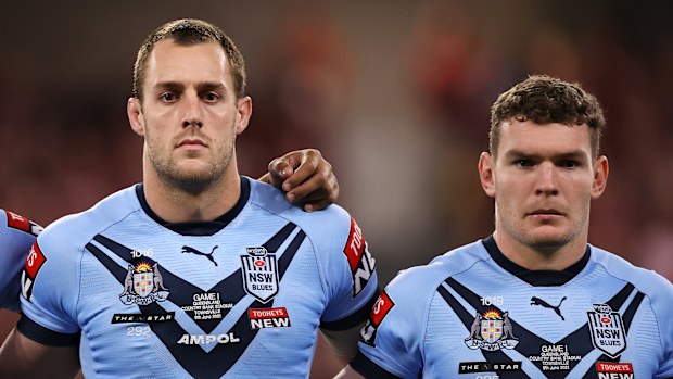 Payne Haas, Isaah Yeo and Liam Martin sing the anthem before game one of the 2021 State of Origin series between the New South Wales Blues and the Queensland Maroons at Queensland Country Bank Stadium on June 09, 2021 in Townsville, Australia. (Photo by Mark Kolbe/Getty Images)