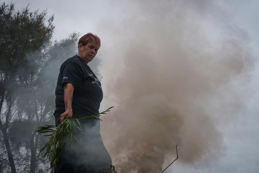 Noongar elder Aunty Tina Hayden carries out a Welcome to Country