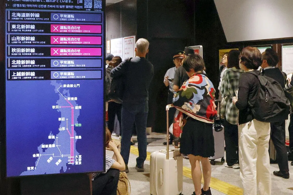 A board displaying suspended railway service due to the impact of an earthquake, at a train station in Sendai, Japan, on June 25.