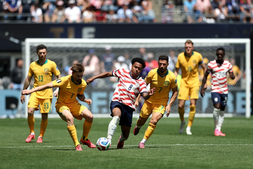 Connor Metcalfe tried to tackle a US player