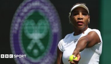 Serena Williams prepares to toss a tennis ball in practice at Wimbledon
