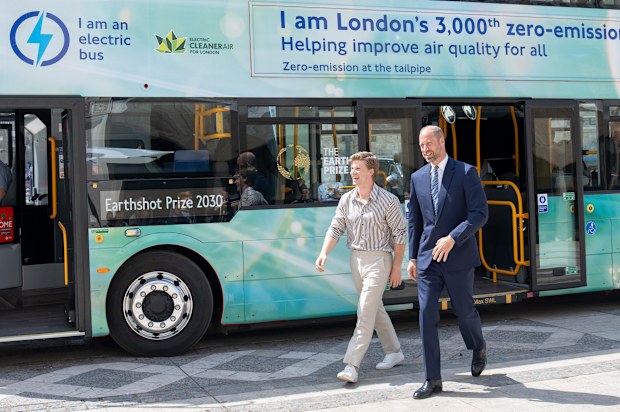 Prince William Prince of Wales and Robert Irwin arrive on a green double decker bus to promote Earthshot Prize in London on June 23, 2026.