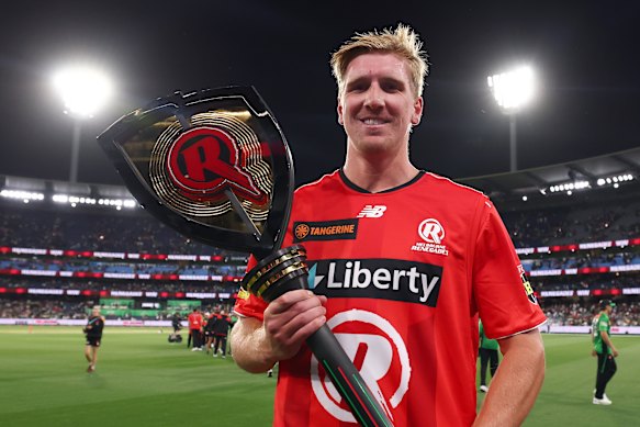 Will Sutherland with the Melbourne Mace after hitting the winning runs for the Renegades in the January 4 derby.