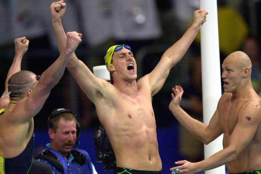 Australian swimmers celebrate winning the men's 4x100m freestyle relay at the Sydney 2000 Games.
