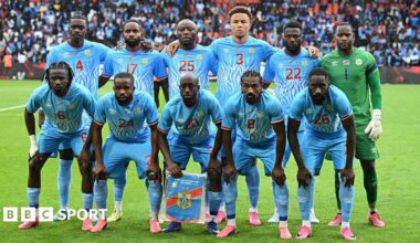 Congo's players pose for a group photo prior to the international friendly football match between Denmark and DR Congo