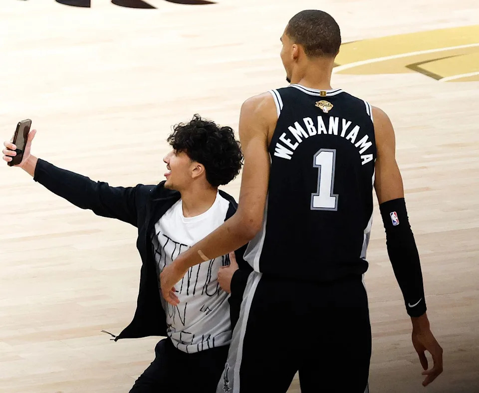 A juvenile fan with Victor Wembanyama in San Antonio on June 3, 2026Credit: Ronald Cortes/Getty
