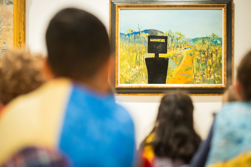 preschool students at Art Gallery of NSW wearing super hereo capes and surrounded by art