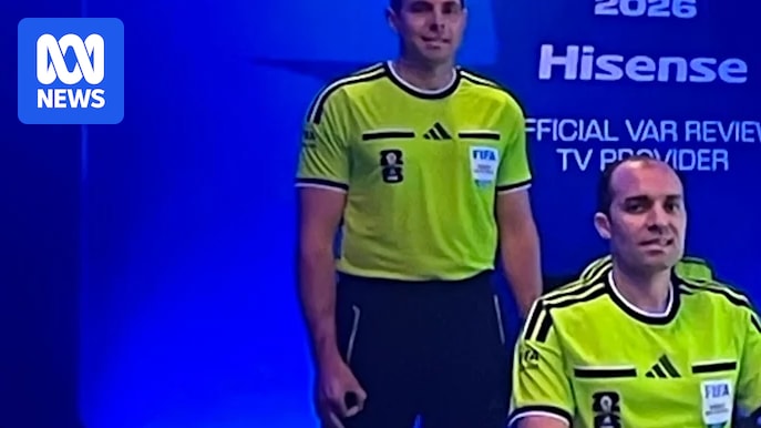 Australian World Cup referee Shaun Evans responds to accusations he used a hate symbol at World Cup
