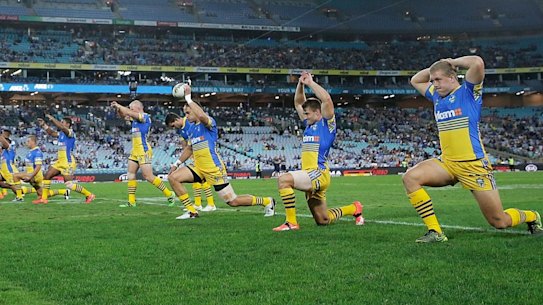 Stretched out: Eels players prepare for the round three match against the Canterbury Bulldogs