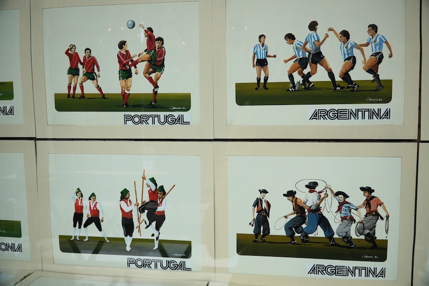 Posters depicting Portugal and Argentina cartoon figures playing football, then in traditional dress