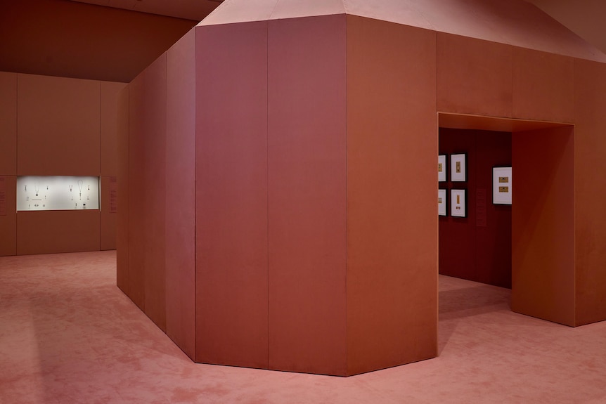 A deep pink coluored part of the NGV's Cartier exhibition
