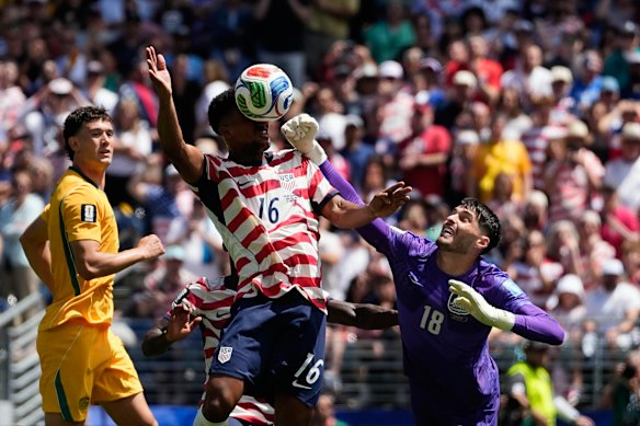 Australia goalkeeper Patrick Beach fails to stop a goal by United States’ Alex Freeman.