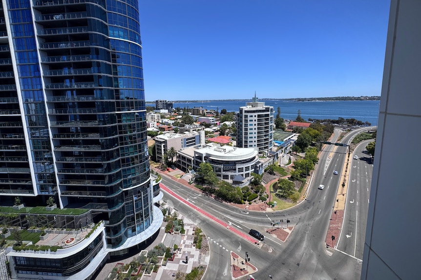 A photo taken of a streetscape from a high-rise