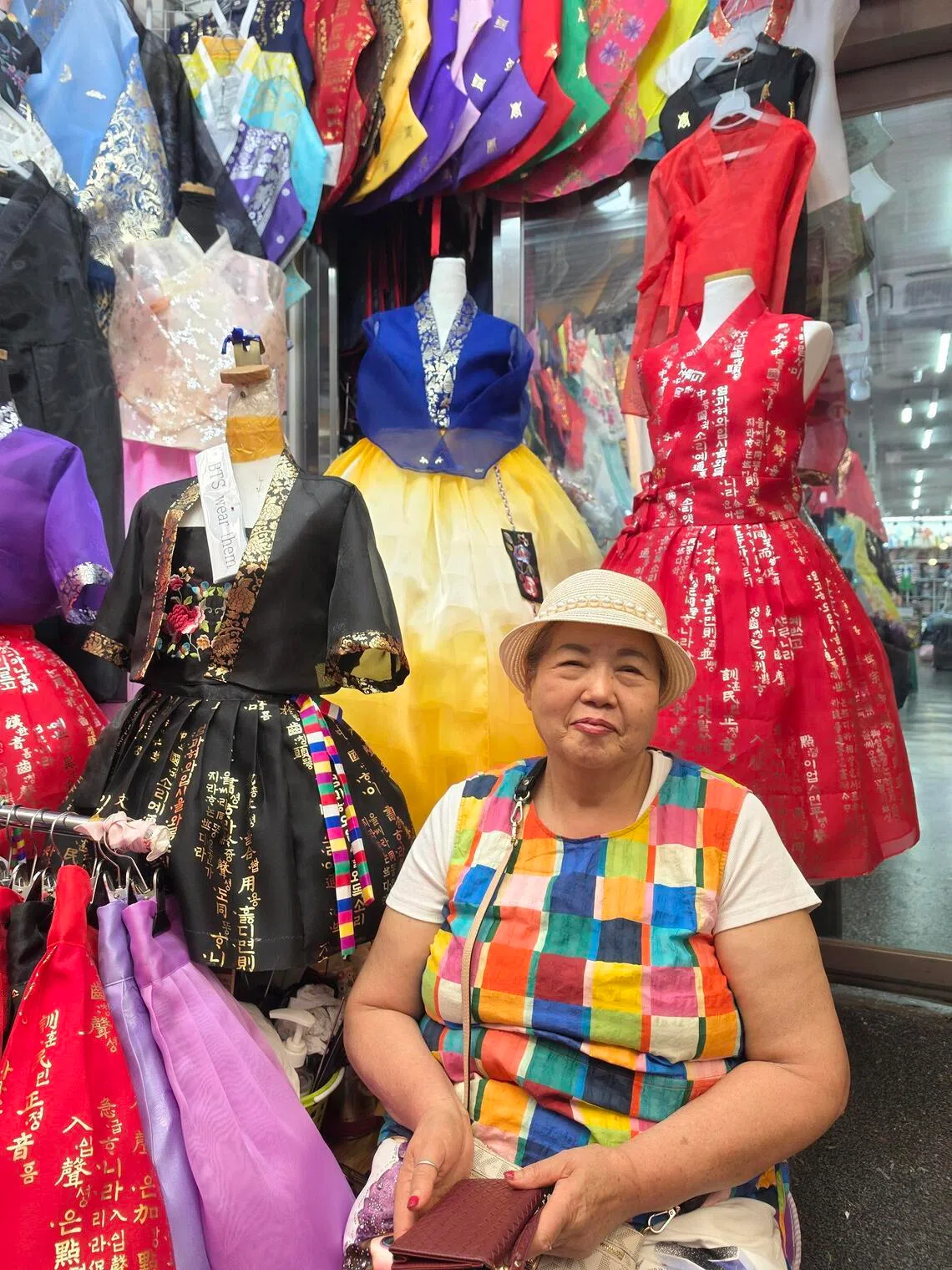 Kim Ok-ja, who has run a hanbok shop in Seoul’s Gwangjang Market for 50 years, said overseas customers have surged following BTS’ comeback concert in March.