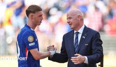 Fifa president Gianni Infantino (right) with Chelsea's Cole Palmer