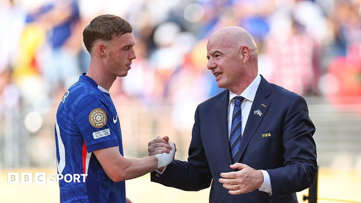 Fifa president Gianni Infantino (right) with Chelsea's Cole Palmer