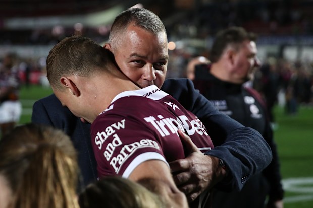 Anthony Seibold embraces Daly Cherry-Evans after the halfback's last game for Manly.