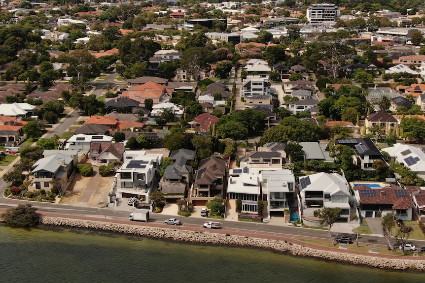 An aerial image of housing in the southern suburb of Applecross, showing the Swan River foreshore.