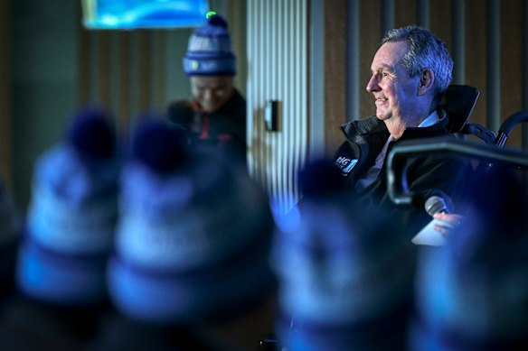 Neale Daniher, pictured addressing Melbourne players ahead of the King’s Birthday clash against Collingwood last year, will be honoured at a state funeral today. 