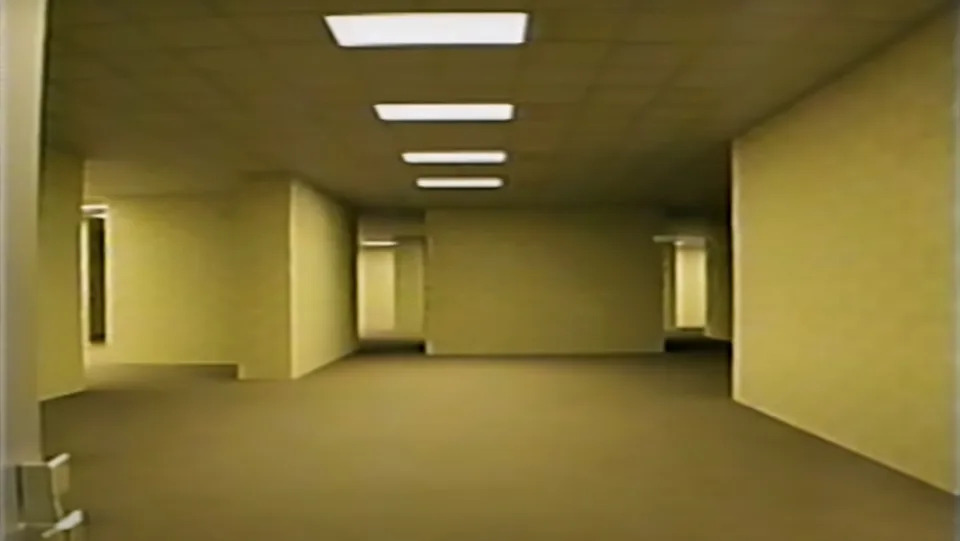 The eponymous neon-lit hallways and odd rooms that make up The Backrooms.
