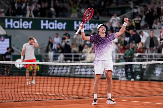 Joao Fonseca celebrates defeating Casper Ruud.