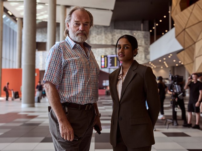 Hugo Weaving and Shabana Azeez in The Airport Chaplain.