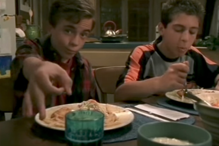 A scene from the show Malcolm in the Middle showing two boys at a table