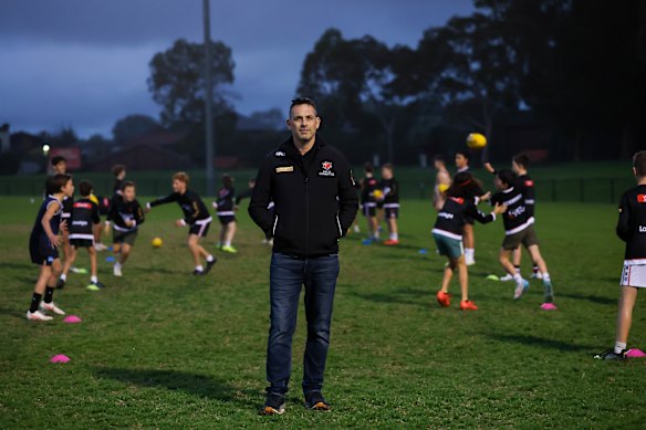 President of AJAX football club Daniel Onas at Wednesday night training this month.