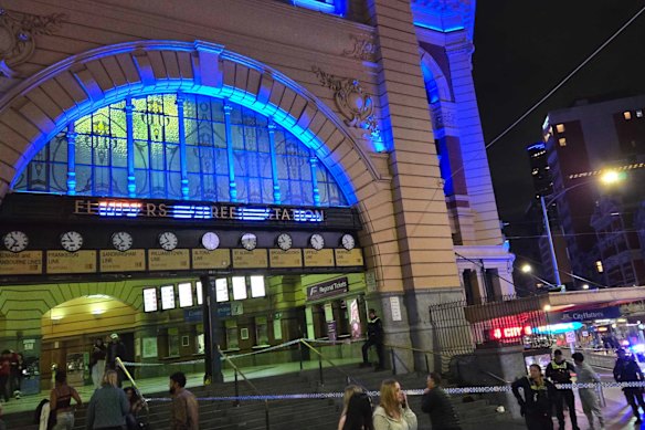 Police tape outside Flinders Street Station on Saturday night.