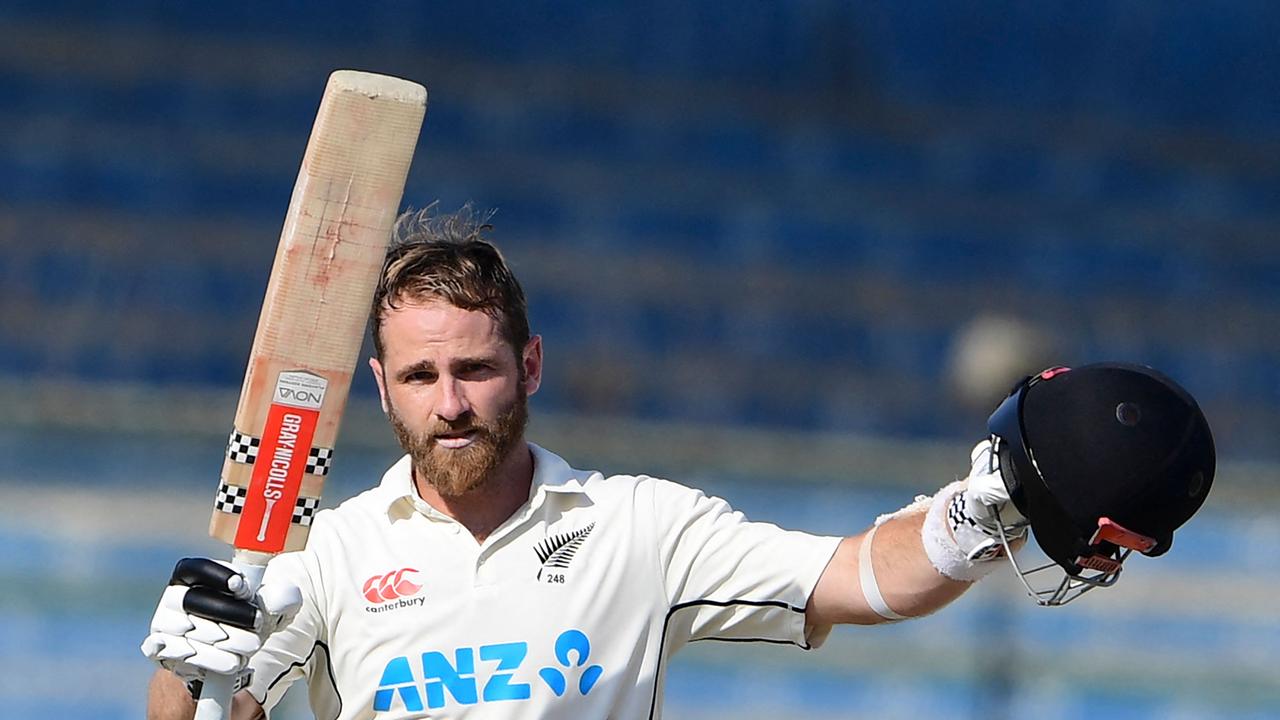 New Zealand's Kane Williamson celebrates scoring a double century (200 runs) during the fourth day of the first Test match between Pakistan and New Zealand at the National stadium in Karachi on December 29, 2022. (Photo by Asif HASSAN / AFP)