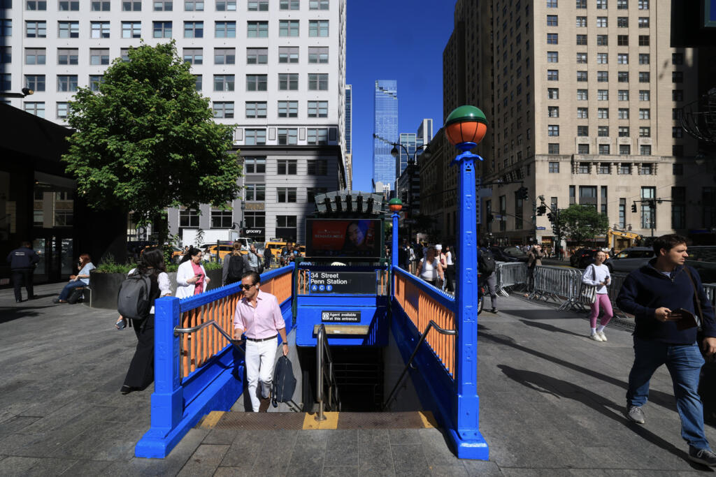 A subway station near Madison Square Garden has been painted in Knicks blue and orange