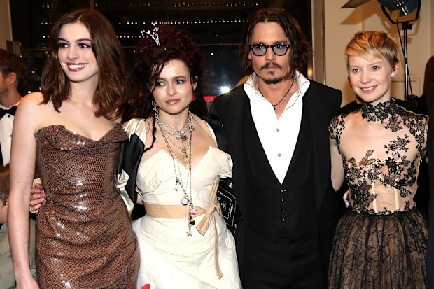Anne Hathaway, Helena Bonham Carter, Johnny Depp and Mia Wasikowska arrive at the Royal World Premiere of 'Alice In Wonderland' at Odeon Leicester Square on February 25, 2010 in London, England.