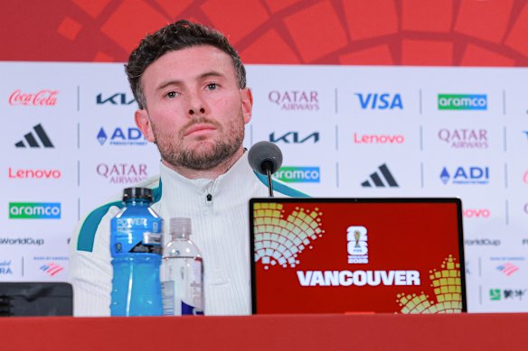 Aiden O’Neill speaks to the press.