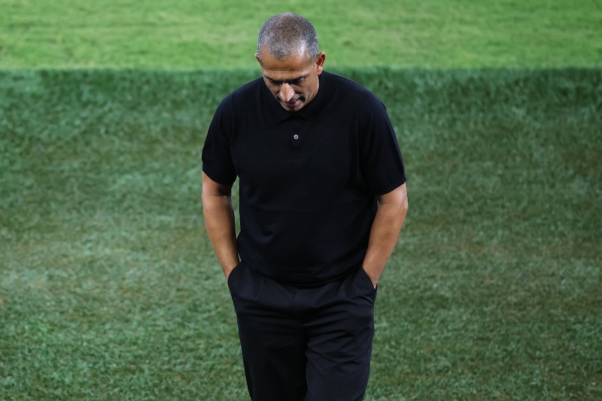 Sabri Lamouchi looks downtrodden on the touchline