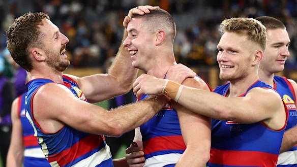 Will Lewis, Nick Coffield and Adam Treloar after the Bulldogs’ stirring win.