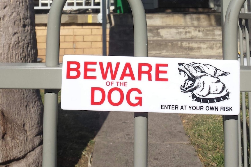 'Beware of the dog' sign outside the house where a child was bitten by two dogs at Bellambi, near Wollongong, July 9, 2014