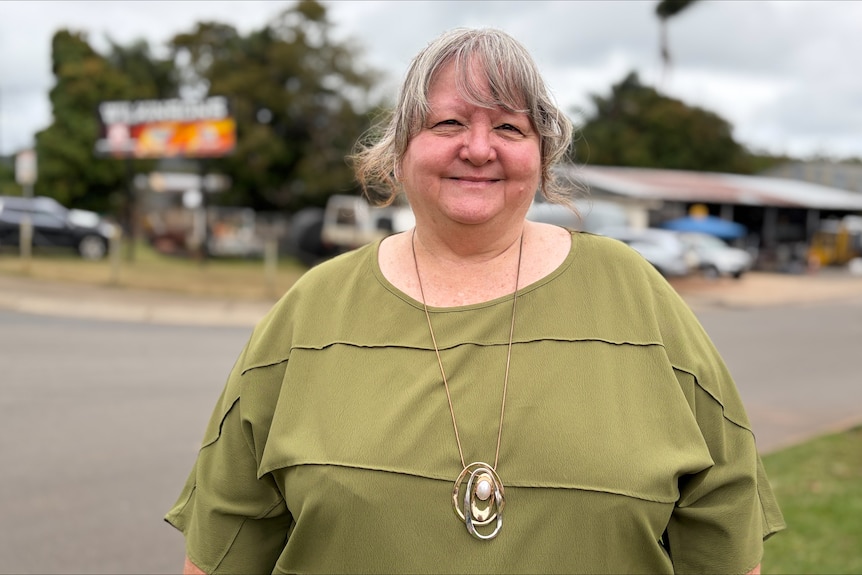 Woman with street in the background