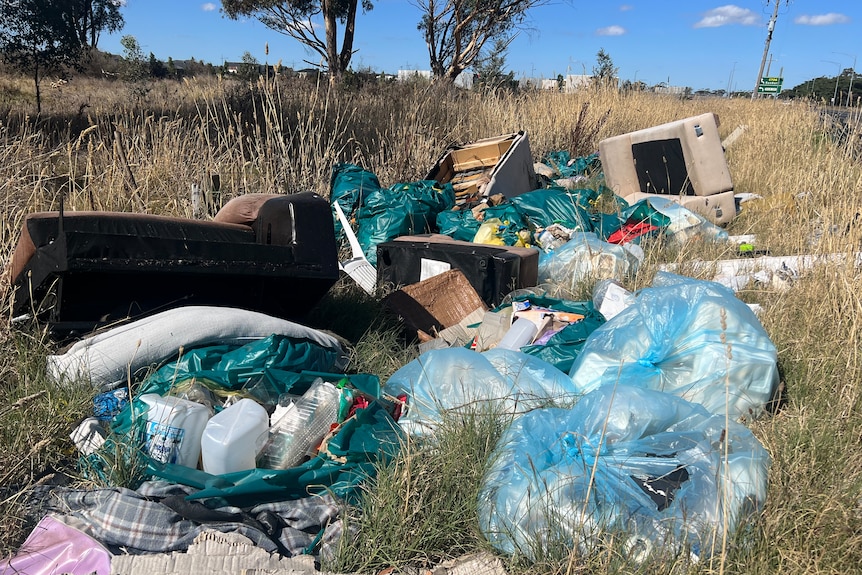 large bags filled with household rubbish.