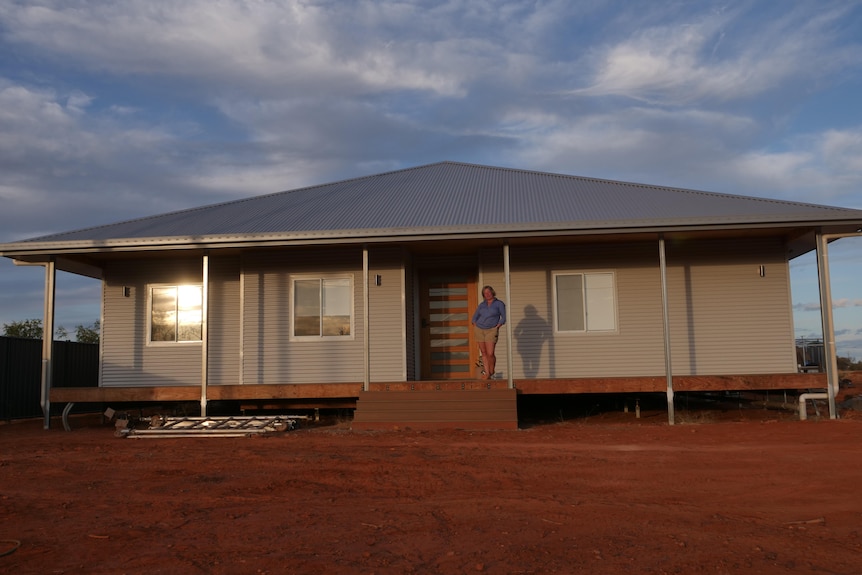 large home with metal wall and roof