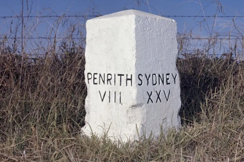 A old file photo of a milestone marking the distance from Penrith to Sydney.