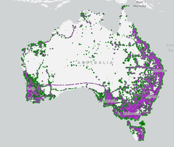 A map of Australia covered with green and purple dots.