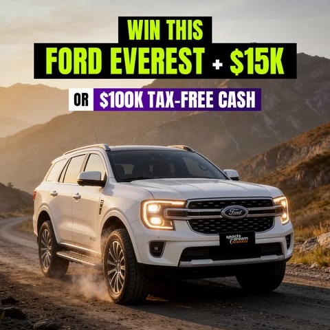 A shiny new Ford four wheel drive on a cliff with the text "Win this Ford Everest + $15K"