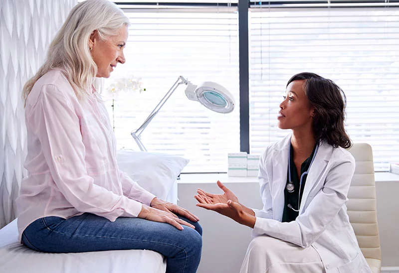A doctor talks with a patient. Treatment options and survival rates for people with pancreatic cancer are improving dramatically with the discovery of new drugs, including daraxonrasib. Photo: Getty Images.